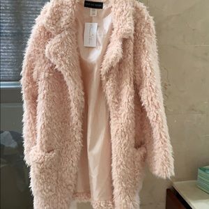 Pink faux fur coat